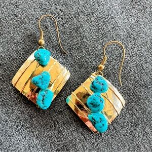 Vintage-style turquoise nugget dangle earrings set in gold-toned metal
